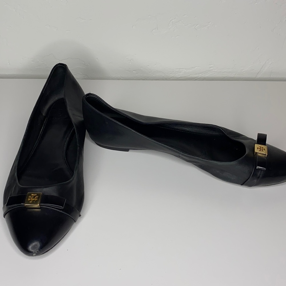 Tory Burch black leather flats with bow detail